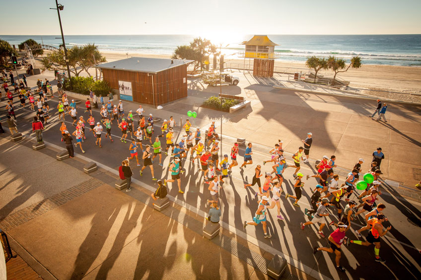 Runners pass through Surfers Paradise