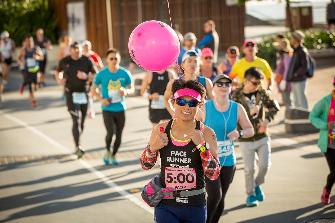 Female pace runner running in Surfers Paradise